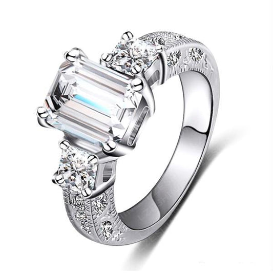 Timeless Three Stone 2.5 Ct Emerald Cut Swiss CZ Diamond Engagement Ring with Princess Accents - Ring for Women