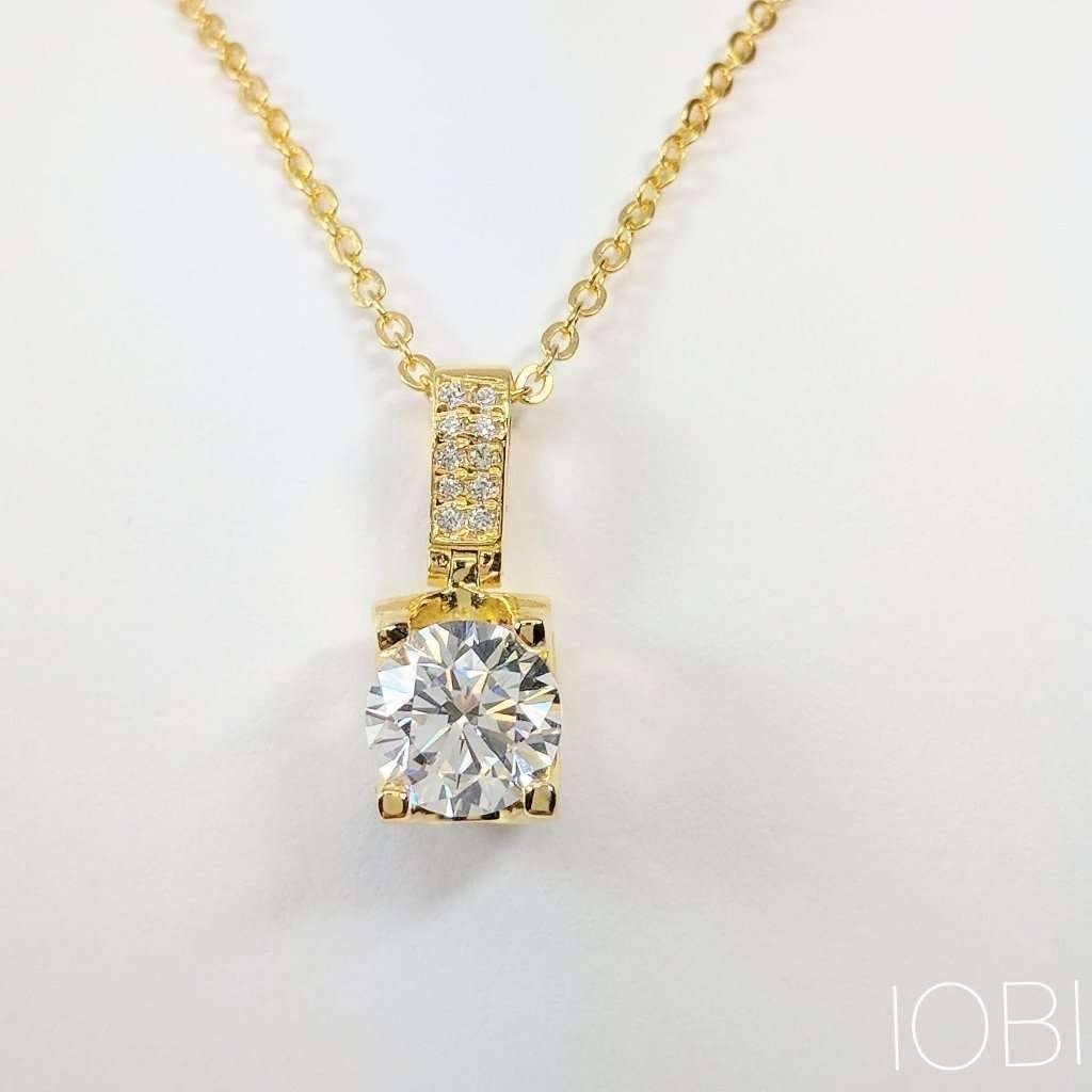 Giselle 1CT Tension Set IOBI Simulated Diamond Solitaire 18K Gold Plated Over Sterling Silver Pendant for Women