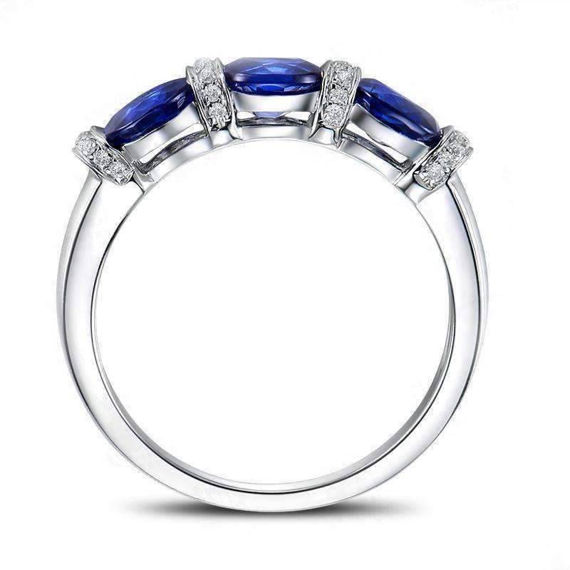 Josette En Bleu 1.5CTW Oval Three Stone Band IOBI Simulated Diamond Ring