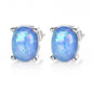 Blue Simulated Fire Opal Oval Solitaire On 14K White Gold Plated Stud Earrings
