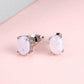 White Simulated Opal Oval Solitaire On 14K White Gold Plated Stud Earrings