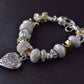 Feshionn IOBI bracelets ON SALE - Pearl White Glass Beads With Heart Charm Bracelet