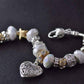 Feshionn IOBI bracelets ON SALE - Pearl White Glass Beads With Heart Charm Bracelet