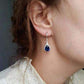 Feshionn IOBI Earrings Beau Monde Pear Cut Simulated Sapphire and Milgraine Hoop Earrings