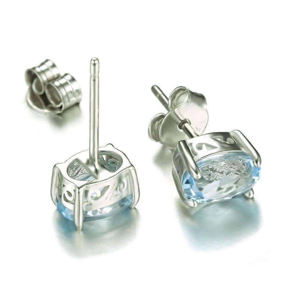 Feshionn IOBI Earrings Ice Blue Genuine Topaz Oval Cut 1.8 CT IOBI Precious Gems Stud Earrings
