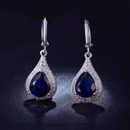 Feshionn IOBI Earrings Sapphire Blue Beau Monde Pear Cut Simulated Sapphire and Milgraine Hoop Earrings