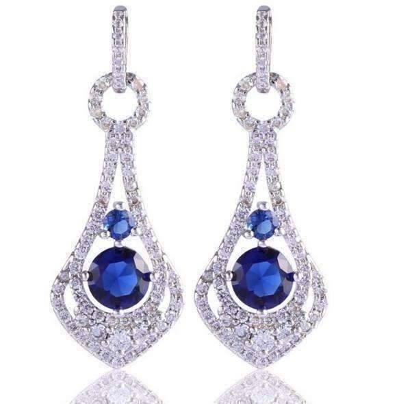 Feshionn IOBI Earrings Sapphire Blue Elite Sapphire Blue CZ Pavé White Gold Plated Chandelier Earrings