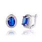 Feshionn IOBI Earrings Sapphire Blue Oval Solitaire Halo Earrings in Sapphire, Emerald, Topaz or White CZ