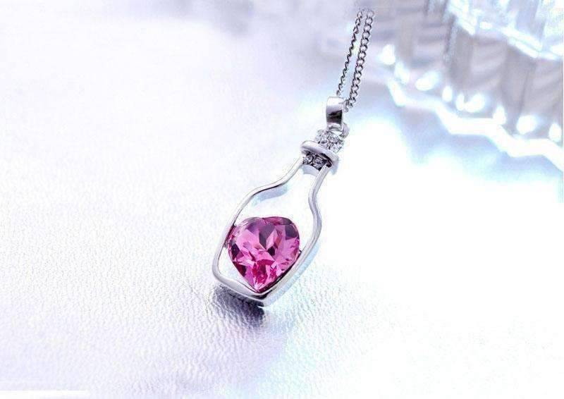 Feshionn IOBI Necklaces ON SALE - Bottled Up Love IOBI Crystals Necklace in Sapphire Pink