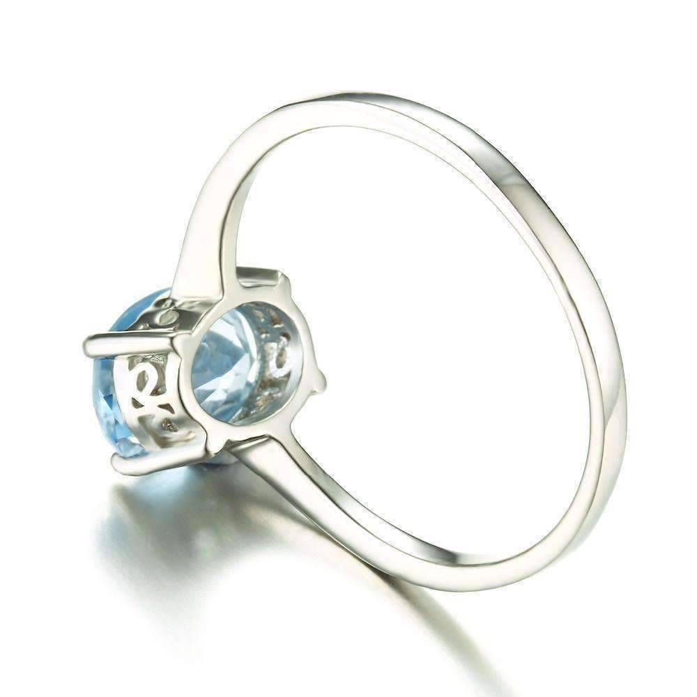 Feshionn IOBI Rings Ice Blue Genuine Topaz Oval Cut 1.5 CT IOBI Precious Gems Ring